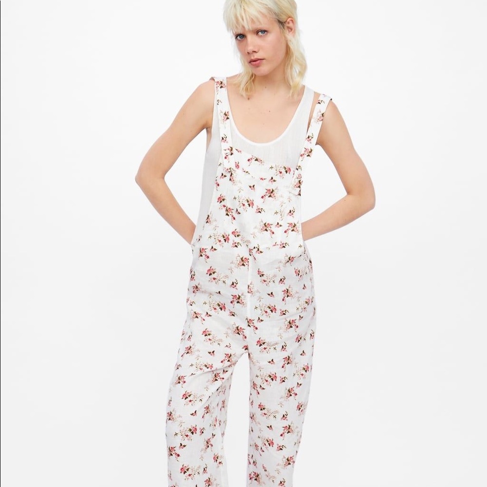 Linen jumpsuit with floral details